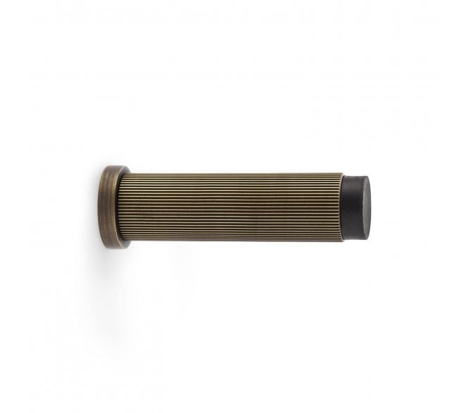 A&W Brunel Reeded Skirting Doorstop 76mm - Antique Brass