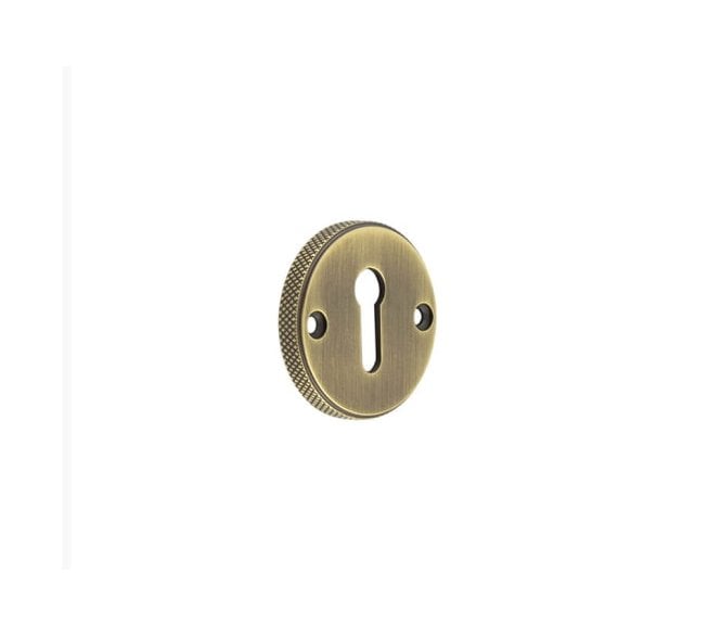 Burlington BUR182 Knurled Standard Keyhole Escutcheon - Antique Brass