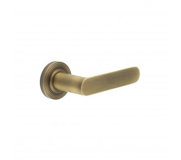 Burlington BUR25 Kensington Door Handle On Reeded Rose - Antique Brass