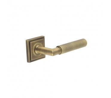 Burlington BUR40 Piccadilly Door Handle On Square Stepped Rose - Antique Brass