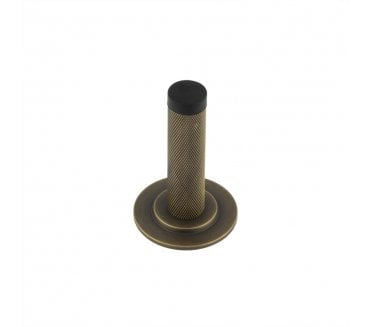 Burlington Knurled Wall Mounted Door Stop On Stepped Rose - Antique Brass