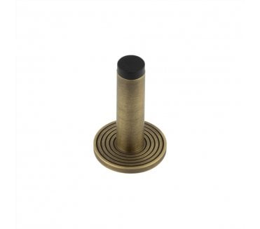 Burlington Plain Wall Mounted Door Stop On Reeded Rose - Antique Brass