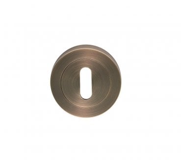Carlisle Brass Belas Standard Keyhole Escutcheon - Antique Brass