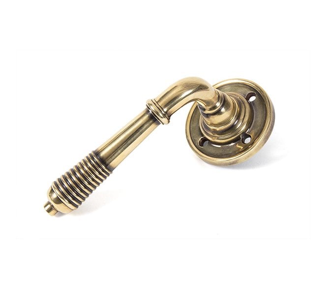 From The Anvil 33087 Reeded Lever Handle On Rose Set - Aged Brass