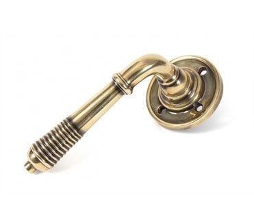 From The Anvil 33087 Reeded Lever Handle On Rose Set - Aged Brass