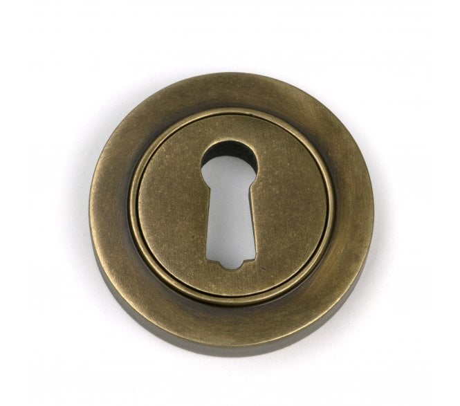 From The Anvil 52443 Standard Keyhole Escutcheon (Plain) - Burnished Brass
