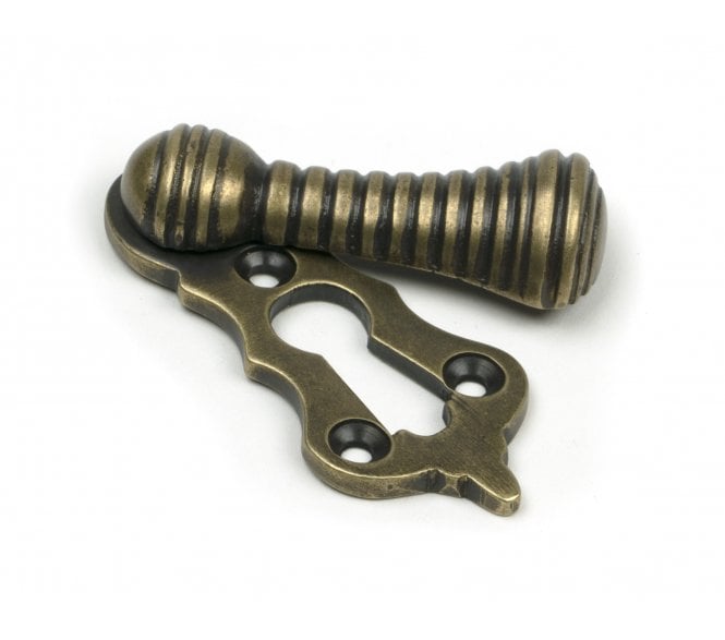 From The Anvil 52453 Beehive Covered Standard Keyhole Escutcheon - Burnished Brass