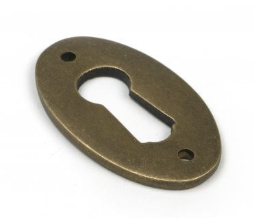 From The Anvil 52455 Oval Standard Keyhole Escutcheon - Burnished Brass