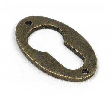 From The Anvil 52457 Oval Euro Profile Escutcheon - Burnished Brass