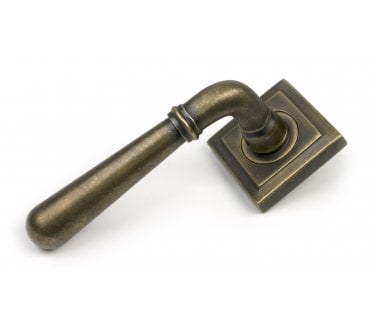 From The Anvil 52643 Newbury Door Handle On Rose Set (Square) - Unsprung - Burnished Brass