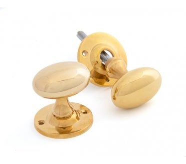 From The Anvil 83627 Oval Mortice/Rim Knob Set - Polished Brass