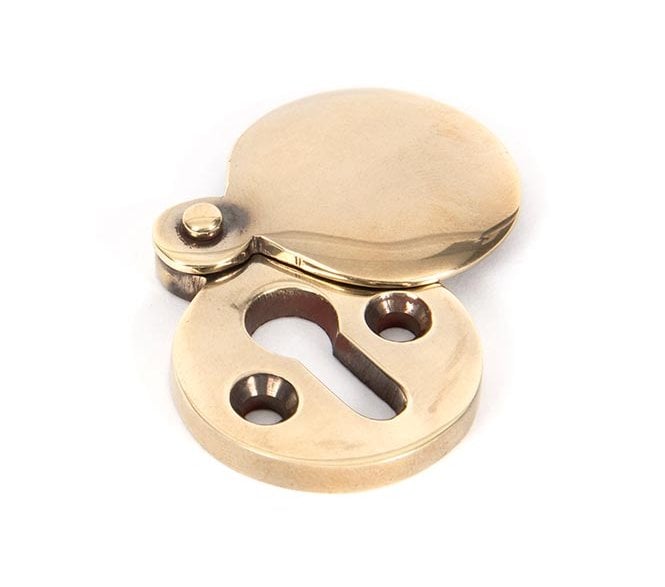 From The Anvil 83805 Round Covered Keyhole Escutcheon - Aged Brass