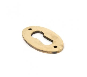 From The Anvil 83818 Period Oval Keyhole Escutcheon - Aged Brass