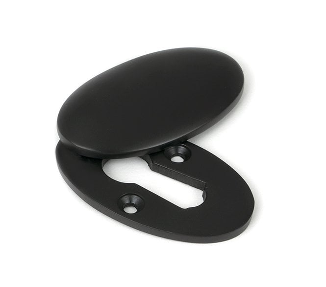 From The Anvil 91991 Period Oval Covered Standard Keyhole Escutcheon - Aged Bronze