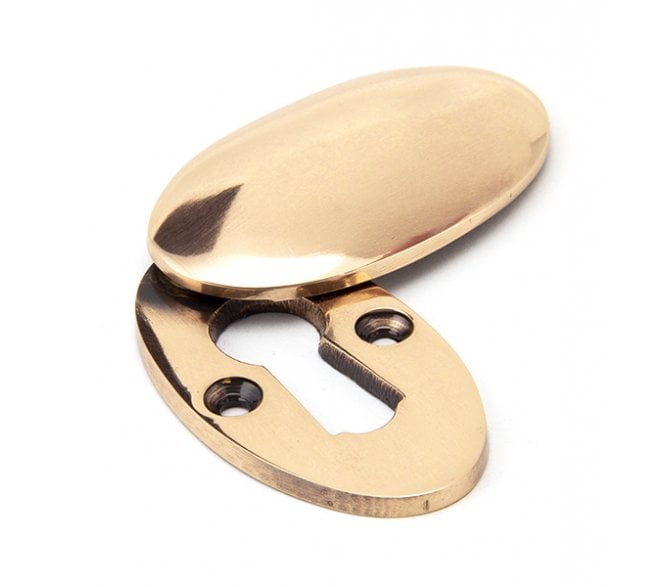 From The Anvil 91992 Period Oval Covered Standard Keyhole Escutcheon - Polished Bronze