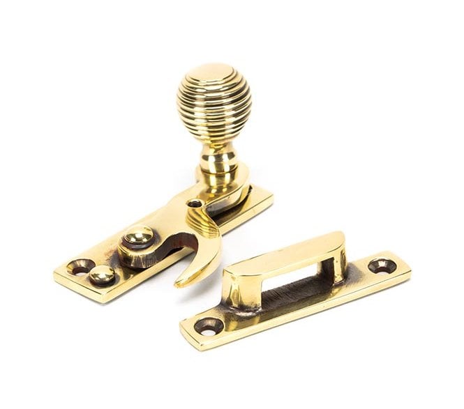 From The Anvil Aged Brass Beehive Sash Hook Fastener