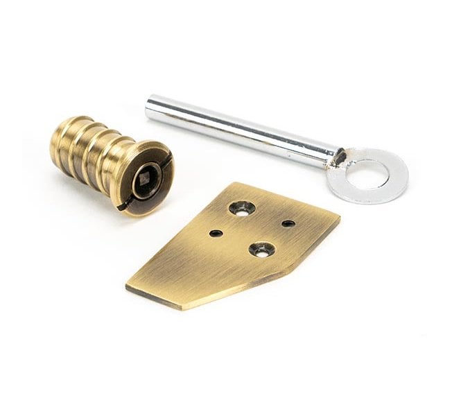 From The Anvil Aged Brass Key-Flush Sash Stop