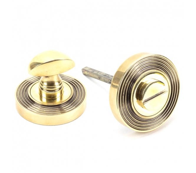 From The Anvil Aged Brass Round Thumbturn Set (Beehive)