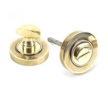 From The Anvil Aged Brass Round Thumbturn Set (Plain)