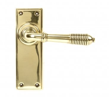 From The Anvil Reeded Door Handles On Backplate - Aged Brass