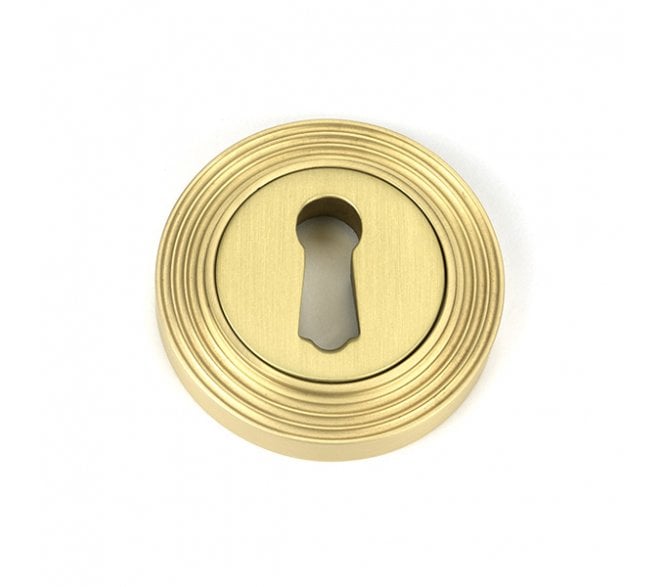From The Anvil Satin Brass Round Escutcheon (Beehive)