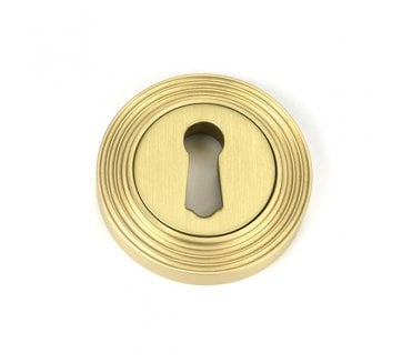 From The Anvil Satin Brass Round Escutcheon (Beehive)