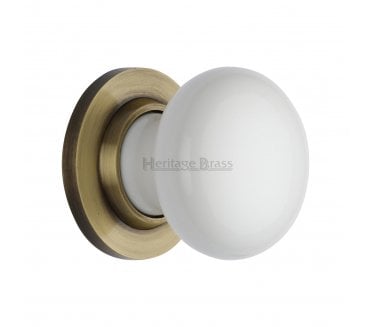 Heritage Brass 5010-AT Porcelain Door Knobs - Antique Brass