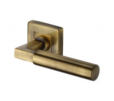 Heritage Brass Bauhaus Door Handles on Square Rose - Antique Brass