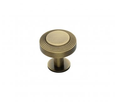 Heritage Brass C3958 Ridge Cabinet Knobs On Rose - Antique Brass