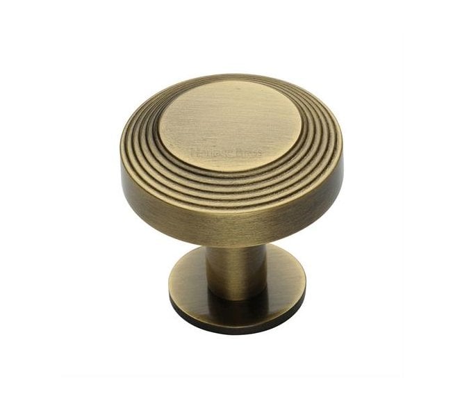 Heritage Brass C3958 Ridge Cabinet Knobs On Rose - Antique Brass