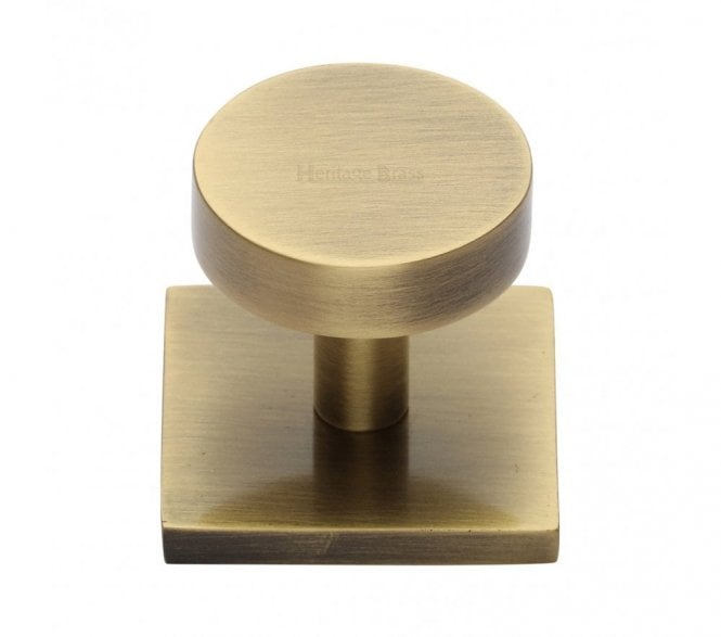 Heritage Brass Disc  Designer Cabinet Knob on Square Backplate - Antique Brass