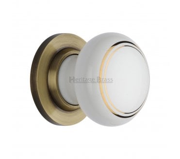 Heritage Brass Porcelain Gold Line Door Knobs - Antique Brass