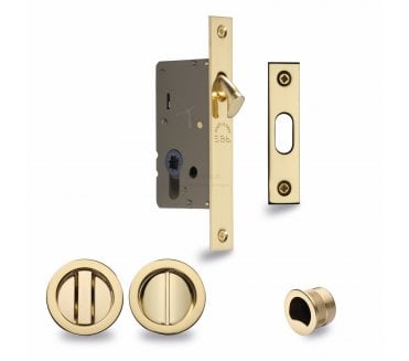 Heritage Brass Round Sliding Pocket Door Bathroom Lock Set - Polished Brass
