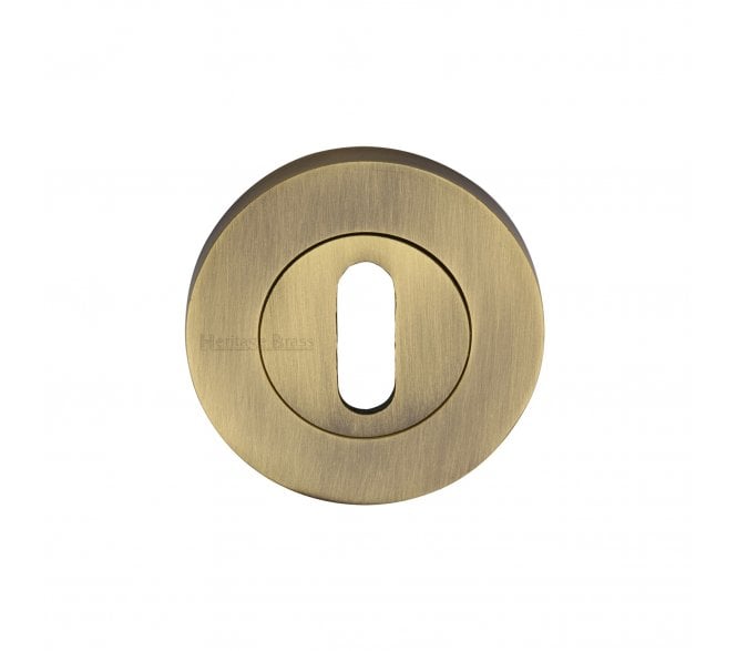 Heritage Brass Signac Standard Keyhole Escutcheon  -  Antique Brass