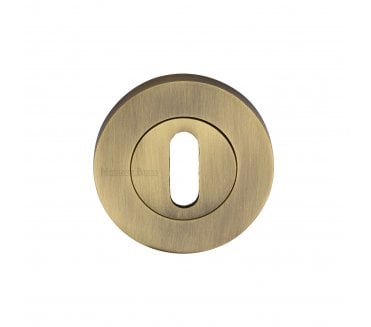 Heritage Brass Signac Standard Keyhole Escutcheon  -  Antique Brass