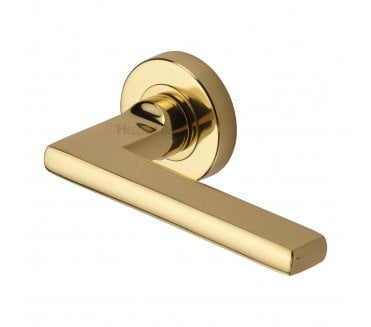 Heritage Brass Trident Door Handles On Round Rose - Polished Brass