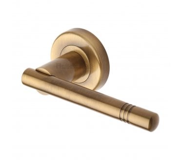 Heritage Brass V2100  Alicia Door Handles On Round Rose - Antique Brass