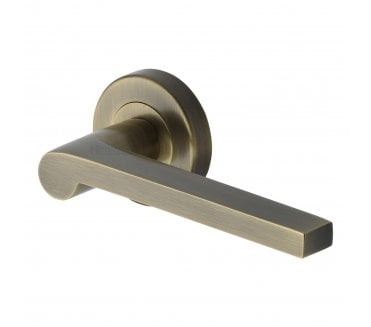 Heritage Brass V6225 Metro Mid Century Lever on Rose - Antique Brass
