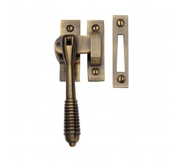 Heritage Brass V894L Reeded-End Casement Fastener (Lockable) - Antique Brass