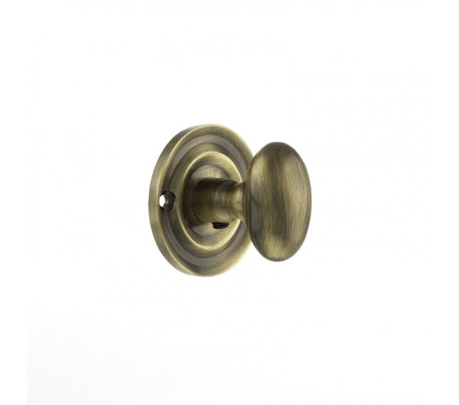 Old English Small Oval Bathroom Turn & Release - Antique Brass