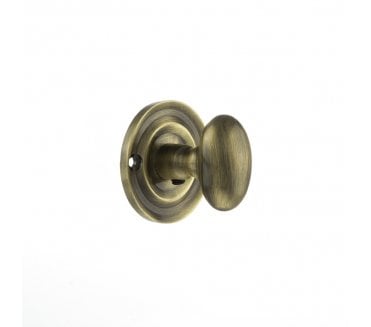 Old English Small Oval Bathroom Turn & Release - Antique Brass