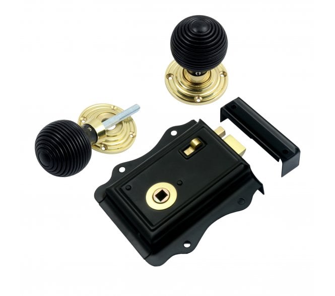 Prima Fancy Rim Latch & Ebony Reeded Rim Knobs - Polished Brass