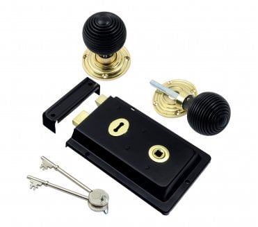 Prima Flanged Black Rim Lock c/w Ebony Beehive Rim Knobs - Brass Roses