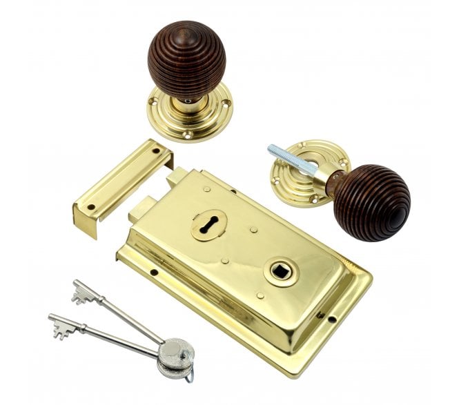 Prima Flanged Rim Lock c/w Rosewood Beehive Rim Knobs - Polished Brass
