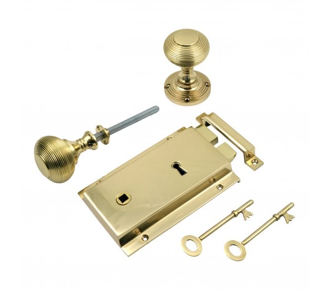Prima Heavy Cast Rim Lock & Reeded Rim Knobs - Polished Brass