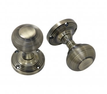 Prima Queen Ann Reeded Mortice Knobs - Antique Brass