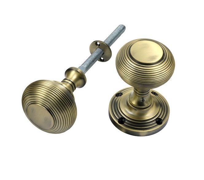 Prima Reeded Rim Knobs - Antique Brass