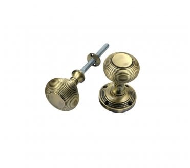 Prima Reeded Rim Knobs - Antique Brass
