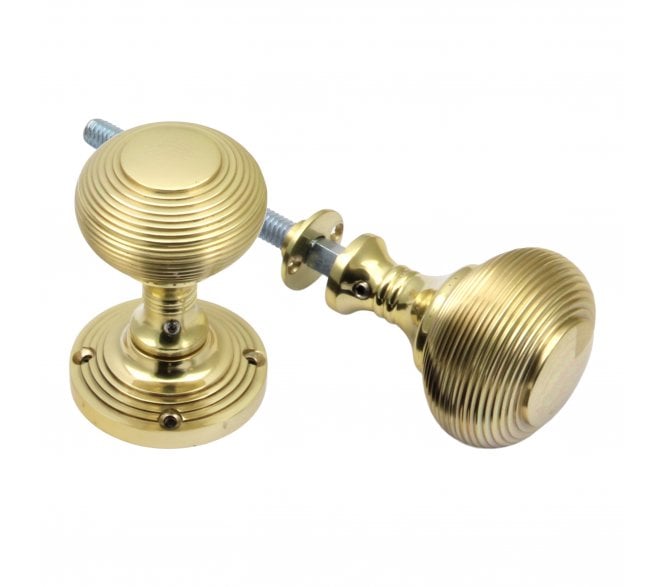 Prima Reeded Rim Knobs - Polished Brass