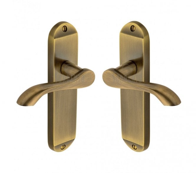 Sorrento Aurora Door Handles On Backplate - Antique Brass